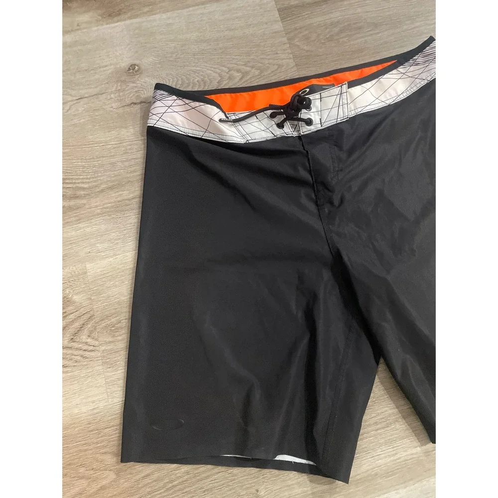 Oakley Geo Ellipse 18 Boardshorts Mens 33 Black Orange 482446-02E Surf Swim